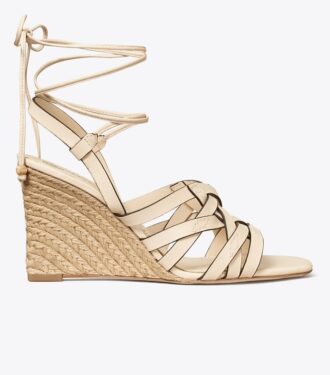 Espadrille med kilehæl i kurveflet Espadrille med kilehæl i kurveflet