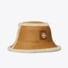 Vendbar bucket hat i shearling