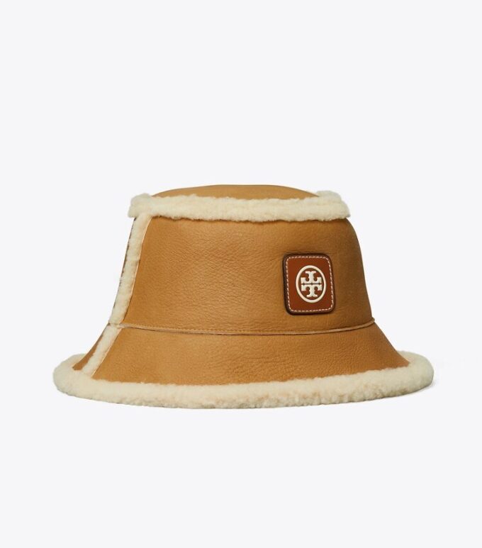 Vendbar bucket hat i shearling