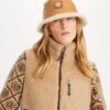 Vendbar bucket hat i shearling