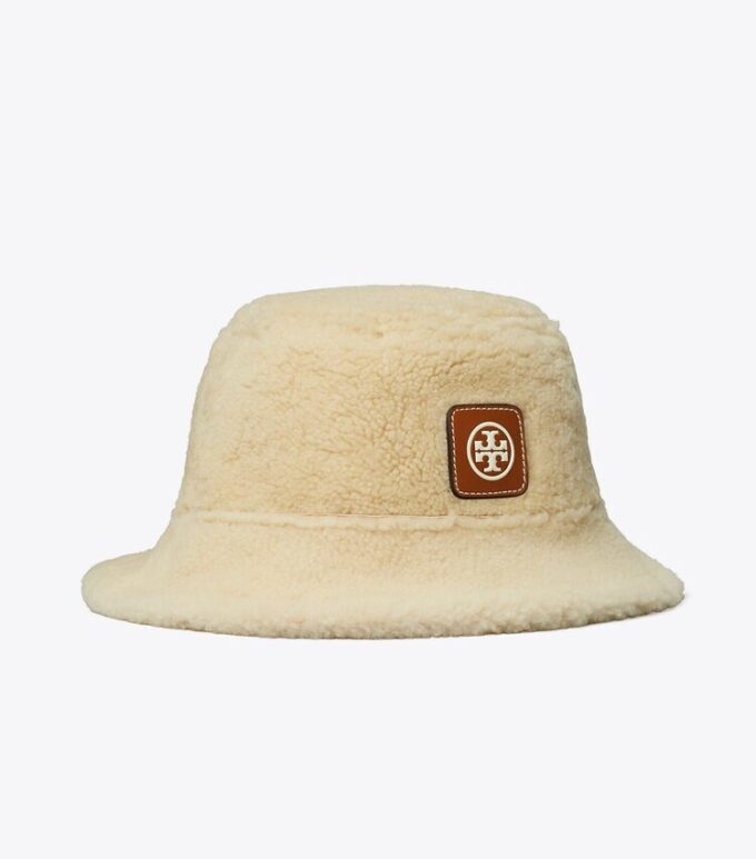 Vendbar bucket hat i shearling