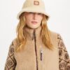 Vendbar bucket hat i shearling